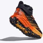 Hoka Speedgoat 5 Mid GTX Herren-Trailrunningschuh in Schwarz/Orange – Rueckseite